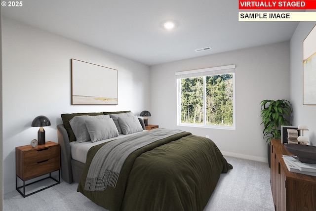 bedroom featuring light carpet, baseboards, and visible vents