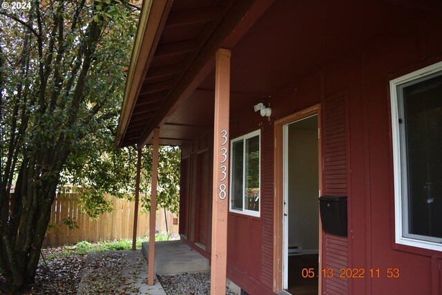 doorway to property featuring a patio area