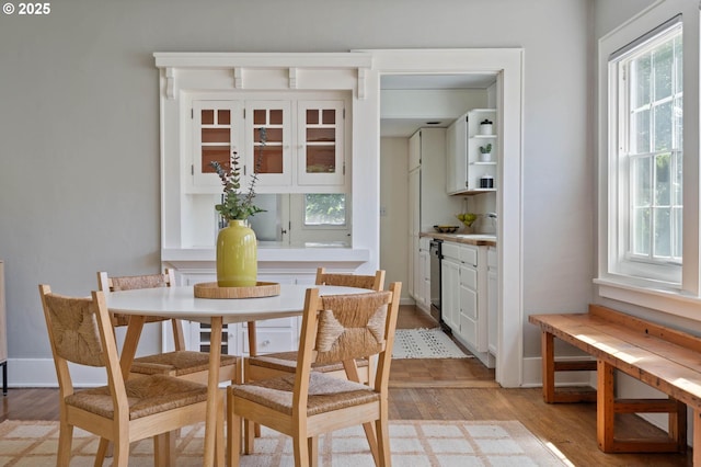 3620 NE 80th Ave, Portland, OR 97213 - dining space with light wood-style floors, healthy amount of natural light, and baseboards