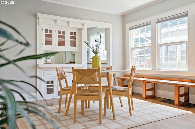 3620 NE 80th Ave, Portland, OR 97213 - dining room featuring light wood-style flooring and crown molding