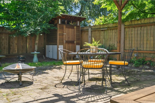 3620 NE 80th Ave, Portland, OR 97213 - fenced backyard with a patio, an outdoor fire pit, and outdoor dining area