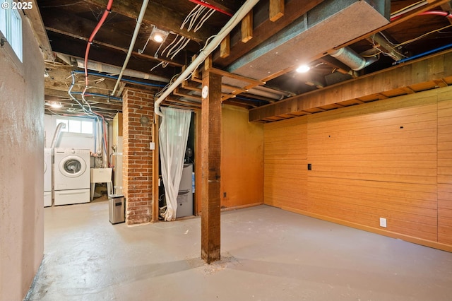 3620 NE 80th Ave, Portland, OR 97213 - below grade area featuring washer and clothes dryer, a sink, and wooden walls