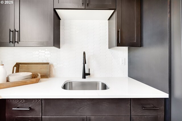 5591 N 87th Ave, Camas, WA 98607 - kitchen featuring dark brown cabinetry, tasteful backsplash, and light countertops