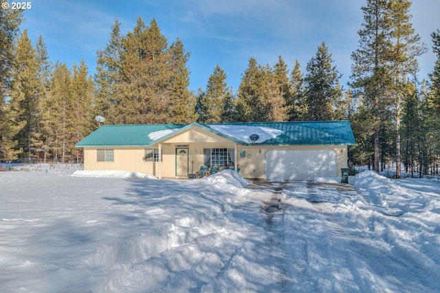 ranch-style home with a garage