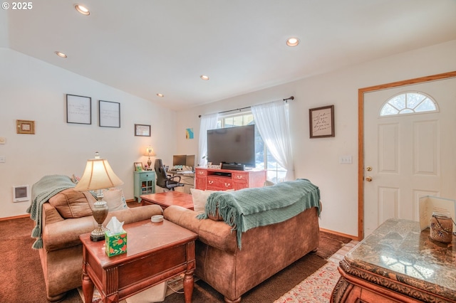 living room with lofted ceiling and carpet flooring