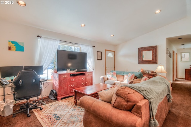 living room with lofted ceiling and carpet floors