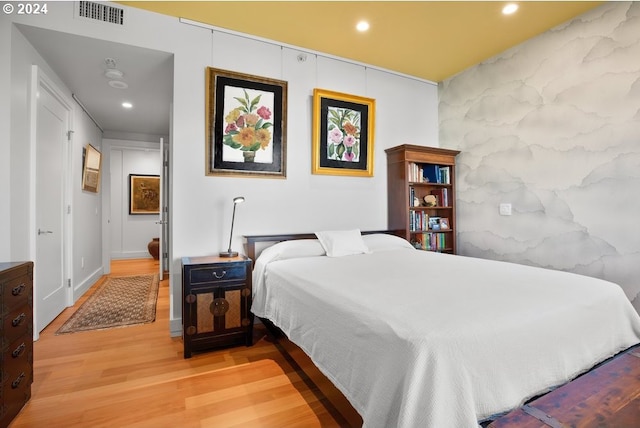 bedroom featuring recessed lighting, light wood-type flooring, and visible vents