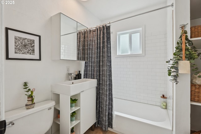 full bathroom with toilet and shower / bath combo