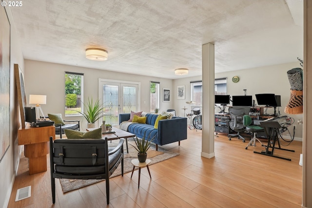 615 NE 81st Ave, Portland, OR 97213 - living room featuring an office area and light wood finished floors