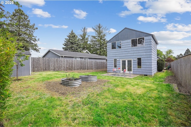 back of property with a patio, an outdoor structure, and a storage unit