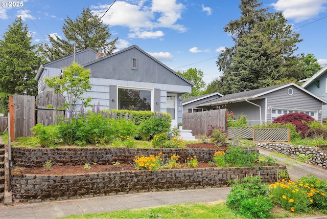 view of home's exterior with fence