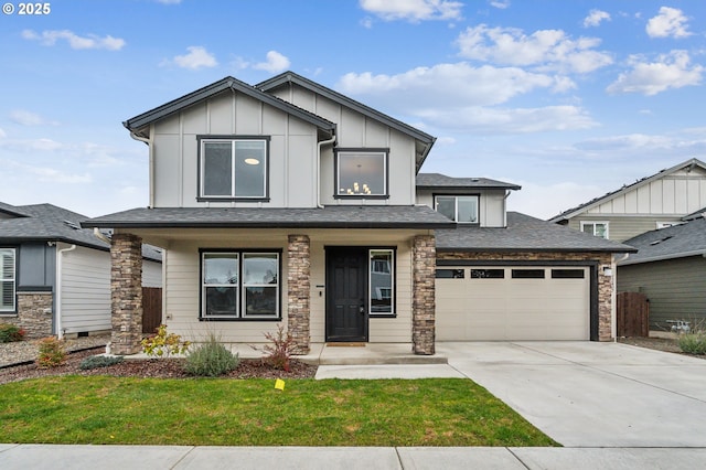 view of front facade featuring concrete driveway, stone siding, covered porch, board and batten siding, and a front yard