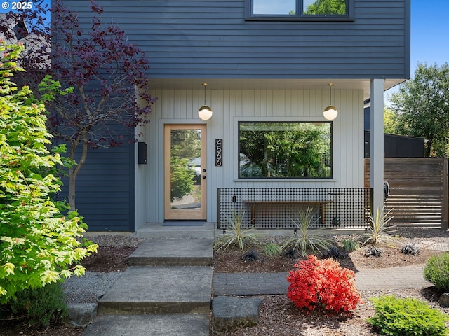 property entrance featuring fence