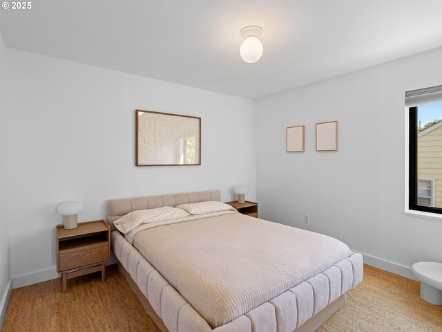 bedroom with baseboards