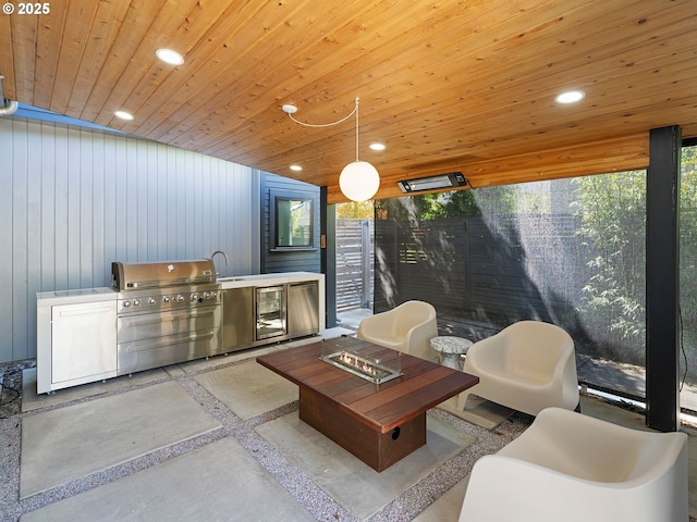 living room featuring inlaid floor details, recessed lighting, and wooden ceiling