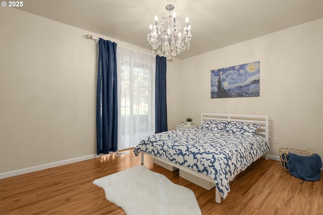 4540 SW 11th St, Gresham, OR 97080 - bedroom featuring a chandelier and wood finished floors