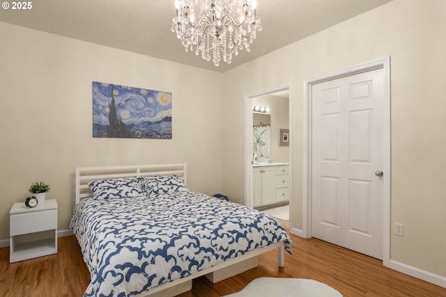 4540 SW 11th St, Gresham, OR 97080 - bedroom with light wood-style floors, a chandelier, and ensuite bathroom