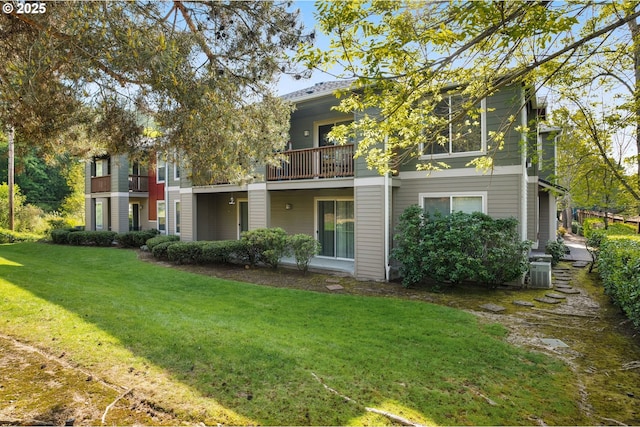 4540 SW 11th St, Gresham, OR 97080 - rear view of property featuring a balcony and a lawn