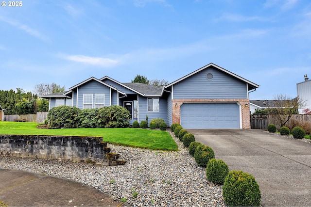 ranch-style home with concrete driveway, fence, and a front lawn