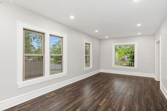 9605 N Hodge Ave, Portland, OR 97203 - spare room with dark wood finished floors, baseboards, and recessed lighting