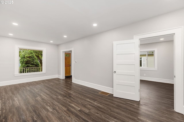 9605 N Hodge Ave, Portland, OR 97203 - spare room with dark wood-type flooring, baseboards, and recessed lighting