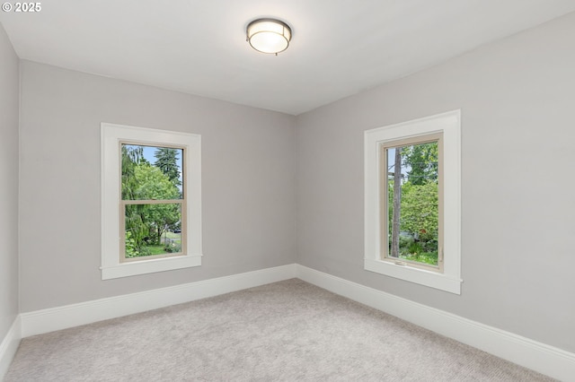 9605 N Hodge Ave, Portland, OR 97203 - carpeted empty room featuring baseboards