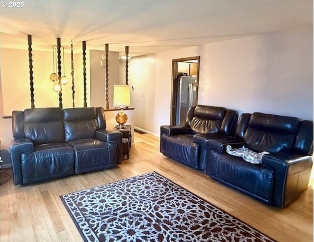 living room with light hardwood / wood-style floors