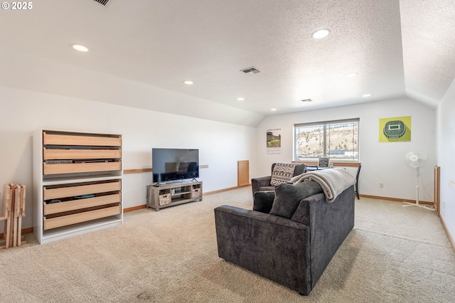 carpeted living room featuring a textured ceiling, recessed lighting, visible vents, baseboards, and vaulted ceiling