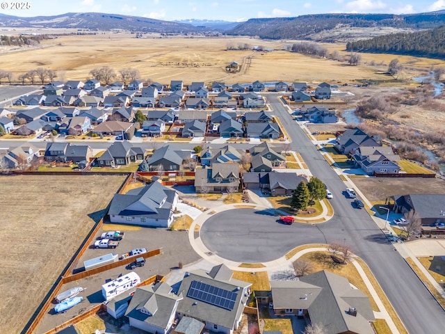 birds eye view of property featuring a residential view and a mountain view