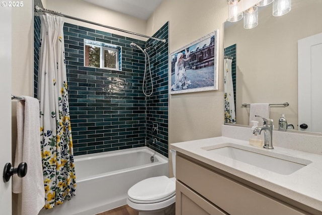 full bathroom with vanity, toilet, and shower / tub combo with curtain