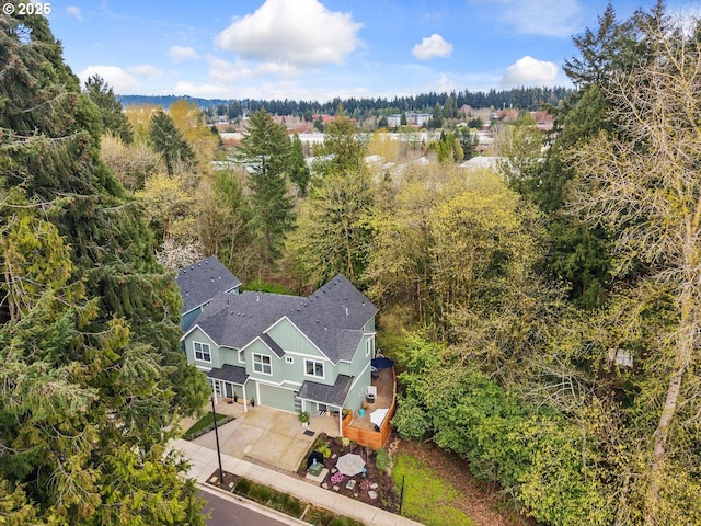 bird's eye view featuring a view of trees