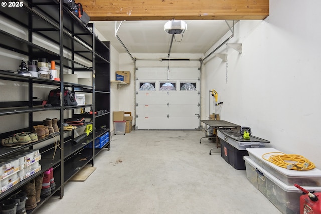 garage featuring a garage door opener