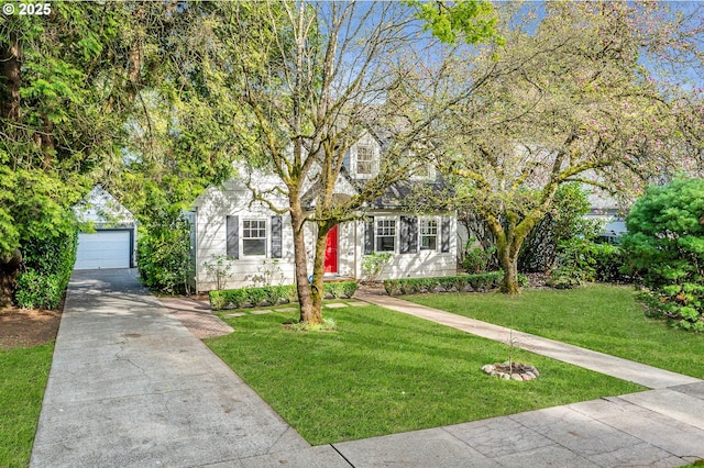 1856 SE Saint Andrews Dr, Portland, OR 97202 - obstructed view of property with an outbuilding, a detached garage, a front lawn, and concrete driveway