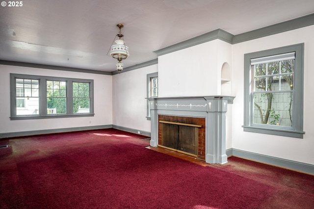 1856 SE Saint Andrews Dr, Portland, OR 97202 - unfurnished living room featuring a fireplace, carpet, healthy amount of natural light, and crown molding