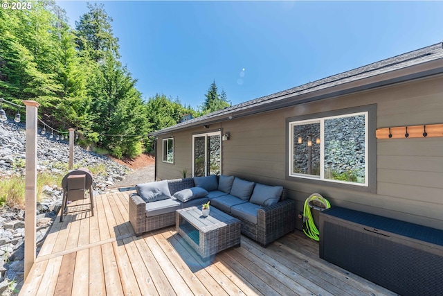 wooden terrace featuring an outdoor living space