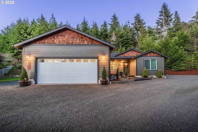 ranch-style home featuring dirt driveway and a garage