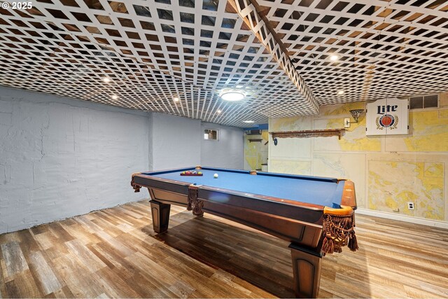 game room with pool table, visible vents, and wood finished floors