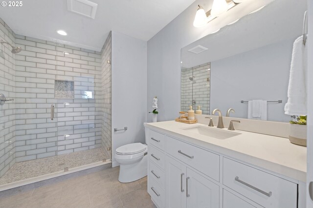 full bathroom with tile patterned flooring, a stall shower, vanity, toilet, and recessed lighting