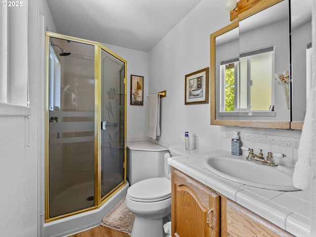 19085 SW Jaylee St, Beaverton, OR 97078 - bathroom with vanity, a shower stall, and wood finished floors