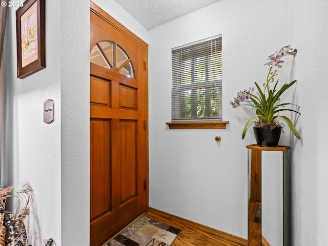 19085 SW Jaylee St, Beaverton, OR 97078 - entryway with wood finished floors and a textured ceiling