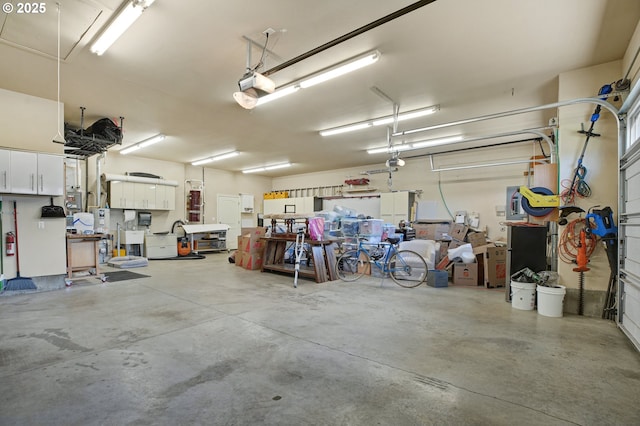 garage featuring a garage door opener