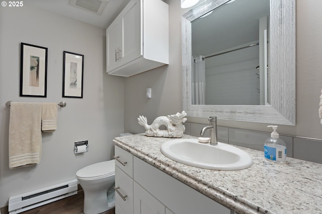16760 SW Monaco Ln, Portland, OR 97224 - bathroom featuring baseboard heating, vanity, a shower with curtain, and wood finished floors