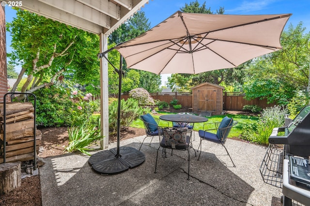16760 SW Monaco Ln, Portland, OR 97224 - fenced backyard featuring a shed, outdoor dining space, a patio, and a grill