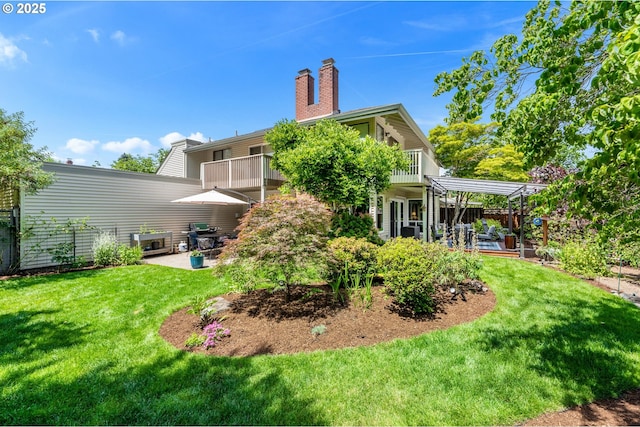 16760 SW Monaco Ln, Portland, OR 97224 - back of house with a patio, a balcony, and a chimney