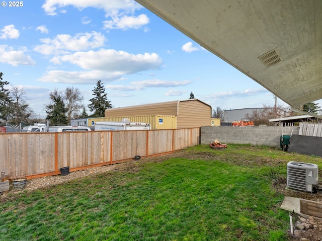 view of yard featuring central AC unit