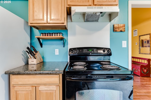 kitchen featuring open shelves, wood finished floors, light brown cabinets, under cabinet range hood, and black range with electric stovetop