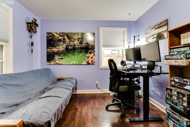 office featuring baseboards and wood finished floors
