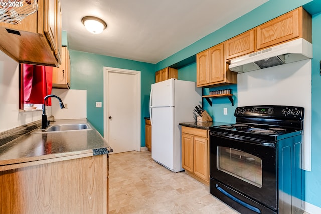 kitchen featuring freestanding refrigerator, black range with electric cooktop, dark countertops, under cabinet range hood, and a sink