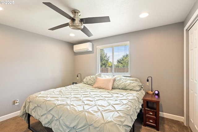 1448 S Grove Lane Ct, Sutherlin, OR 97479 - bedroom with a wall unit AC, dark colored carpet, baseboards, recessed lighting, and a ceiling fan