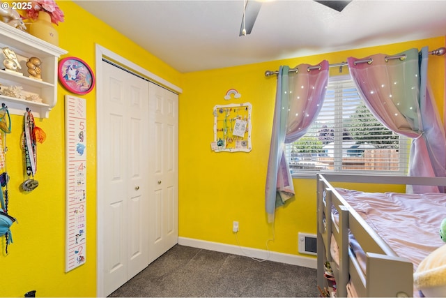 1448 S Grove Lane Ct, Sutherlin, OR 97479 - bedroom featuring a closet, baseboards, dark carpet, and ceiling fan